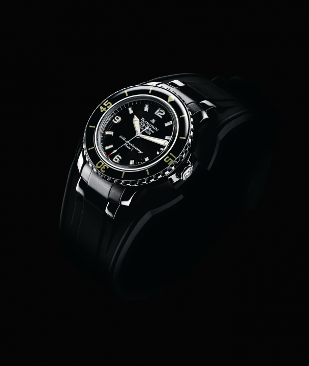 The 2003 Anniversary Fifty Fathoms. Equipped with both a metal bracelet and a large rubber strap for diving, the Anniversary model introduced the bombé sapphire bezel.
