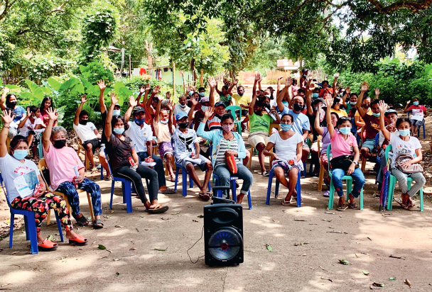 The villagers vote to approve the marine protected areas surrounding their village.
