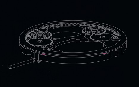 An exterior ring connected to the crown winds both barrels simultaneously.
