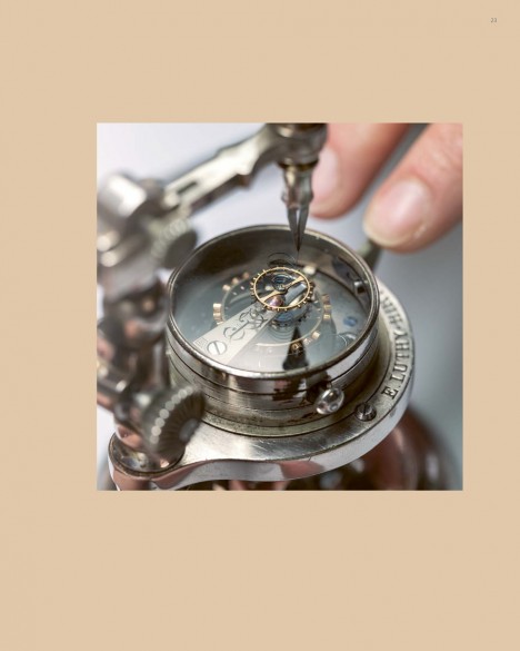 Calibration of the balance wheel and hairspring using traditional tools.
