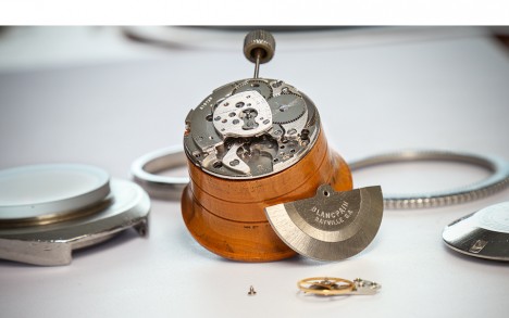 Re-assembly of the movement after cleaning and component restoration.
